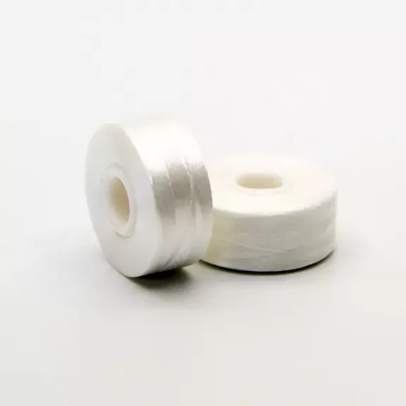 Endi kerugian pabrik sulaman sing didhelikake saka benang bobbin substandard?